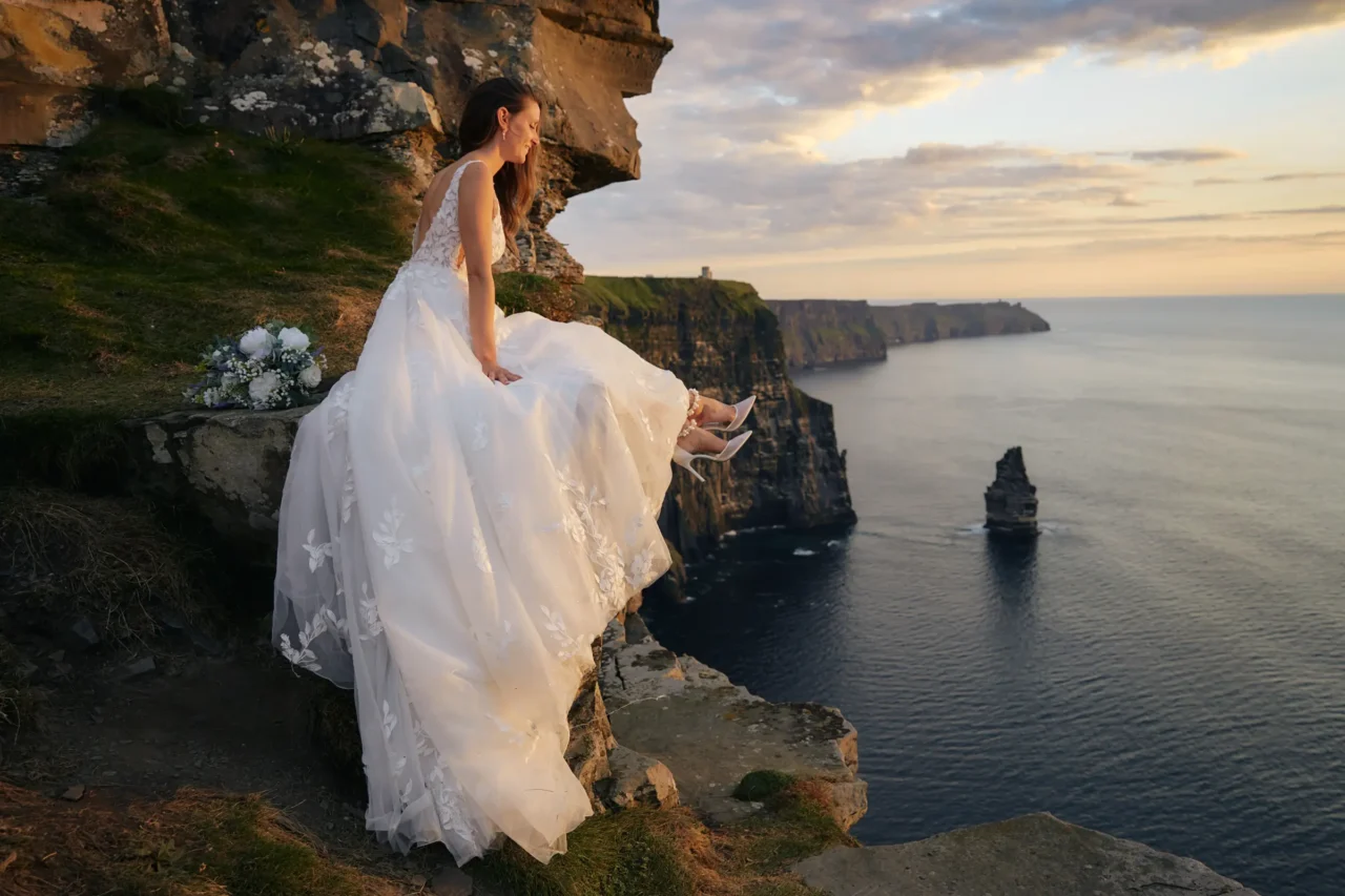 Keri at the edge of the Cliffs of Moher hero