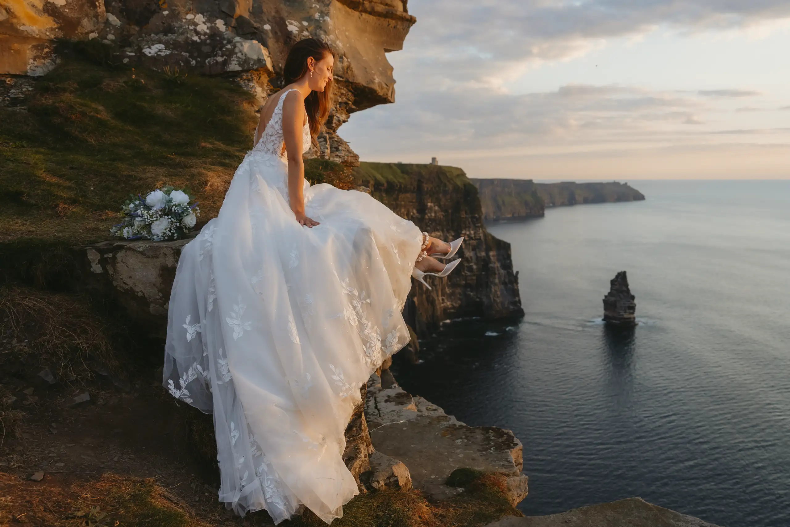 Keri above the Cliffs Of Moher after wedding shoots beladevotee